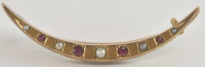 Lot 1326 - A 9ct yellow gold ruby and seed pearl set...