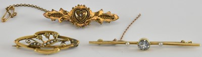 Lot 1323 - A 15ct yellow gold aquamarine and seed pearl...