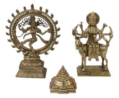 Lot 1024 - An Indian brass figure of Hindu god Shiva,...