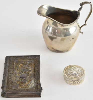 Lot 1180 - A George V hallmarked silver cream jug,...