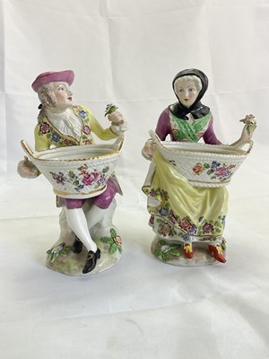 Lot 246 - A pair of 19th century porcelain figural salts,...