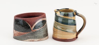 Lot 566 - RICHARD PHETHEAN (born 1953); a slipware jug,...