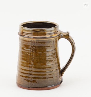 Lot 143 - CLIVE BOWEN (born 1943); a slipware beer mug,...