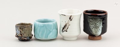 Lot 724 - A group of stoneware and porcelain yunomi and...