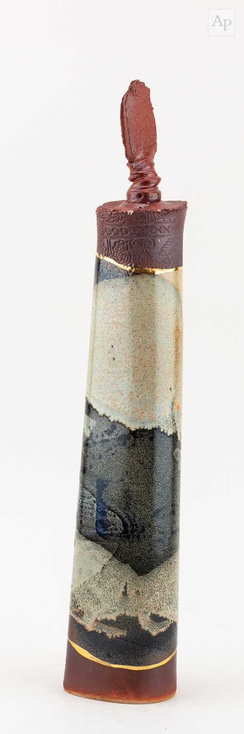 Lot 32 - ANNIE D' OREFICE; a tall stoneware bottle and...