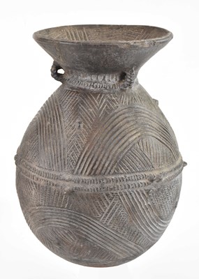 Lot 1539 - A large Nigerian nupe pot, height 40cm.