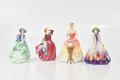Lot 2521 - ROYAL DOULTON; a collection of four figures...