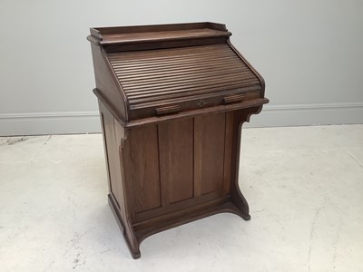 Lot 1177 - An early 20th century Lebus roll-top desk with...