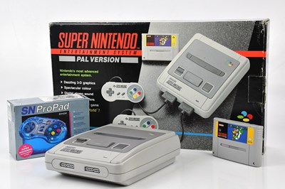 Lot 2113 - NINTENDO; a Super Nintendo boxed console, with...