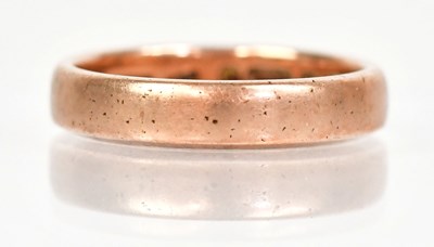 Lot 1318 - A 9ct gold wedding band, size L, approx. 3.5g.
