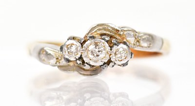 Lot 1284 - An 18ct yellow gold ring with three diamonds...
