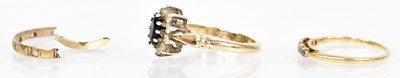 Lot 1359 - Two yellow metal rings, one with central blue...