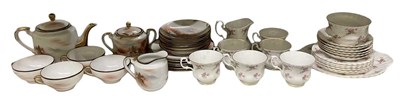 Lot 569 - A Japanese part tea service comprising teapot,...