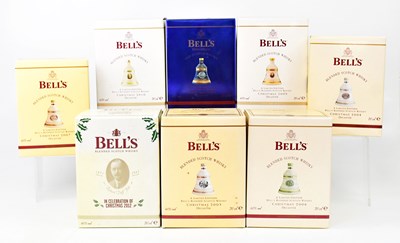 Lot 1034 - Eight Bell's commemorative whisky decanters,...