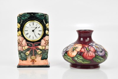 Lot 407 - RACHEL BISHOP FOR MOORCROFT; a mantel clock...