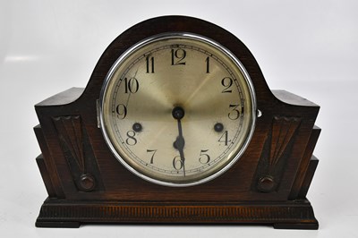 Lot 1336 - A 1930s mantel clock, with silvered dial set...