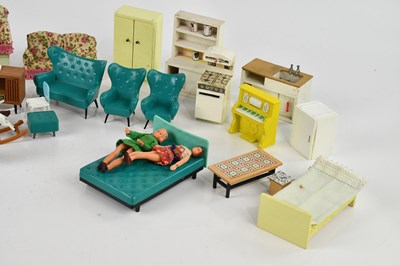 Lot 2102 - A collection of 1960s doll's house furniture...