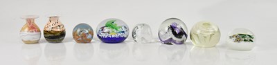 Lot 2382 - A collection of six paperweights including...