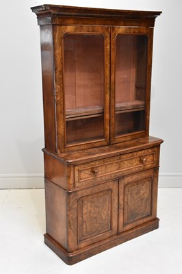 Lot 1178 - A Victorian walnut bookcase with two glazed...