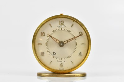 Lot 1270 - JAEGER; an eight day travelling alarm clock,...