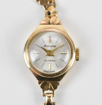 Lot 607 - ACCURIST; a lady's 9ct gold cased wristwatch,...