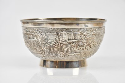 Lot 2057 - A white metal Chinese bowl decorated with...