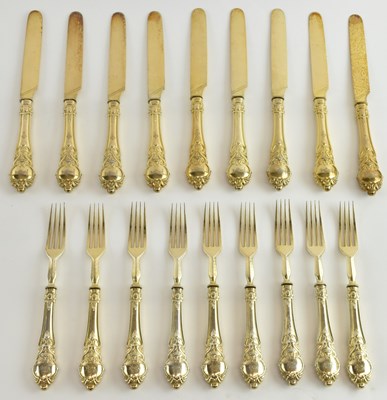 Lot 1105 - A set of nine Victorian silver gilt handled...