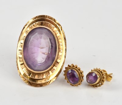 Lot 62 - An unusual 9ct yellow gold and amethyst set...