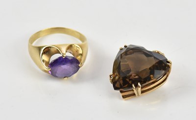 Lot 461 - A yellow metal dress ring set with oval...