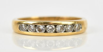 Lot 406 - A yellow metal diamond set dress ring, stamped...