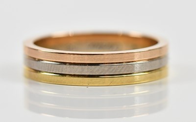 Lot 331 - CARTIER; a tri-metal three section wedding...