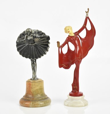 Lot 174 - An Art Deco red painted spelter and...
