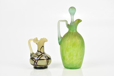 Lot 276 - LOETZ; an Austrian Papillon art glass ewer and...