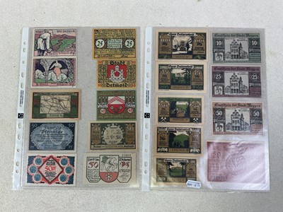 Lot 576 - NOTGELDS; a collection of notes contained in...