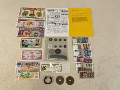 Lot 574 - A small group of coins and banknotes...