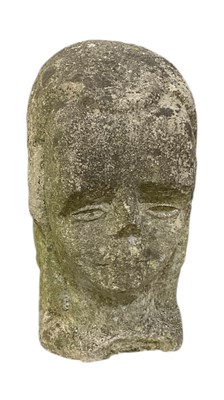 Lot 649 - A carved reconstituted stone head, height 36cm.