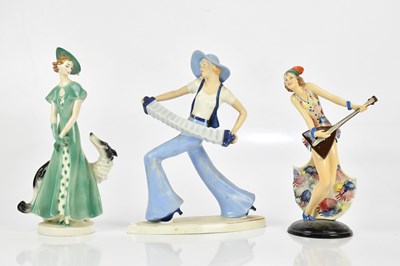 Lot 519 - GOEBEL; an Art Deco figure of a standing...