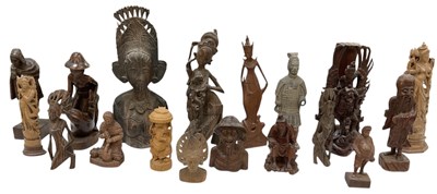 Lot 1033 - A group of approximately sixteen carved...