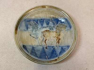 Lot 414 - JENNIE HALE; a sgraffito decorated plate,...