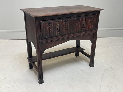 Lot 1085 - THE BATH CABINET MAKERS; a carved oak side...
