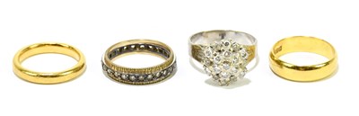 Lot 1124 - A 22ct yellow gold wedding band, size J,...