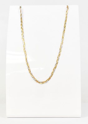 Lot 1431 - An 18ct yellow and white gold three-strand...