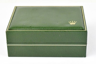 Lot 1569 - ROLEX; an empty green leather watch box with...