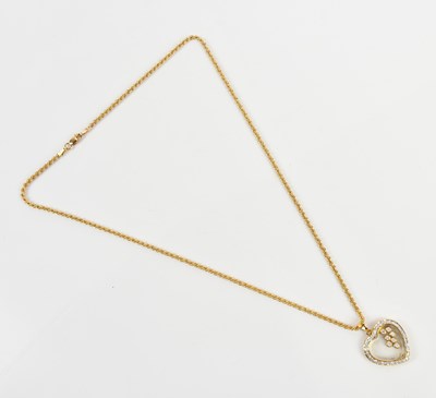 Lot 217 - A yellow metal diamond set 'Happy Diamonds'...
