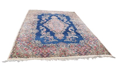Lot 1304 - A large decorative carpet, with floral sprays...