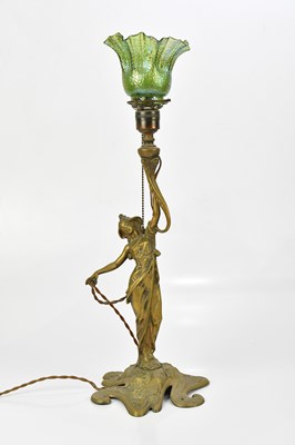 Lot 66 - An Art Nouveau bronzed metal table lamp, the...
