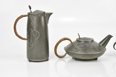 Lot 47 - ARCHIBALD KNOX FOR TUDRIC PEWTER; a four piece...