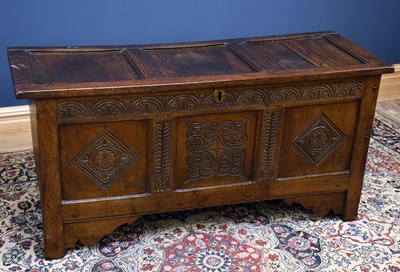 Lot 2940 - An 18th century oak coffer with panelled...