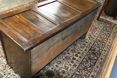 Lot 2940 - An 18th century oak coffer with panelled...