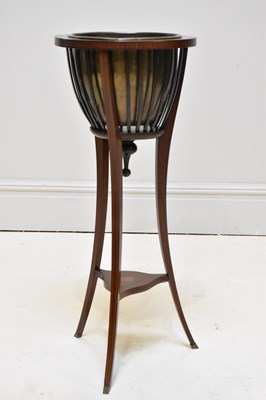 Lot 1195 - An Edwardian inlaid mahogany jadiniere stand,...
